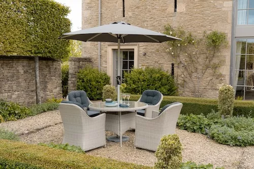 Mont-Crest Round Table and Four Armchairs Set